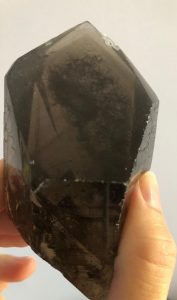 Morion (black smoky quartz) point with phantom